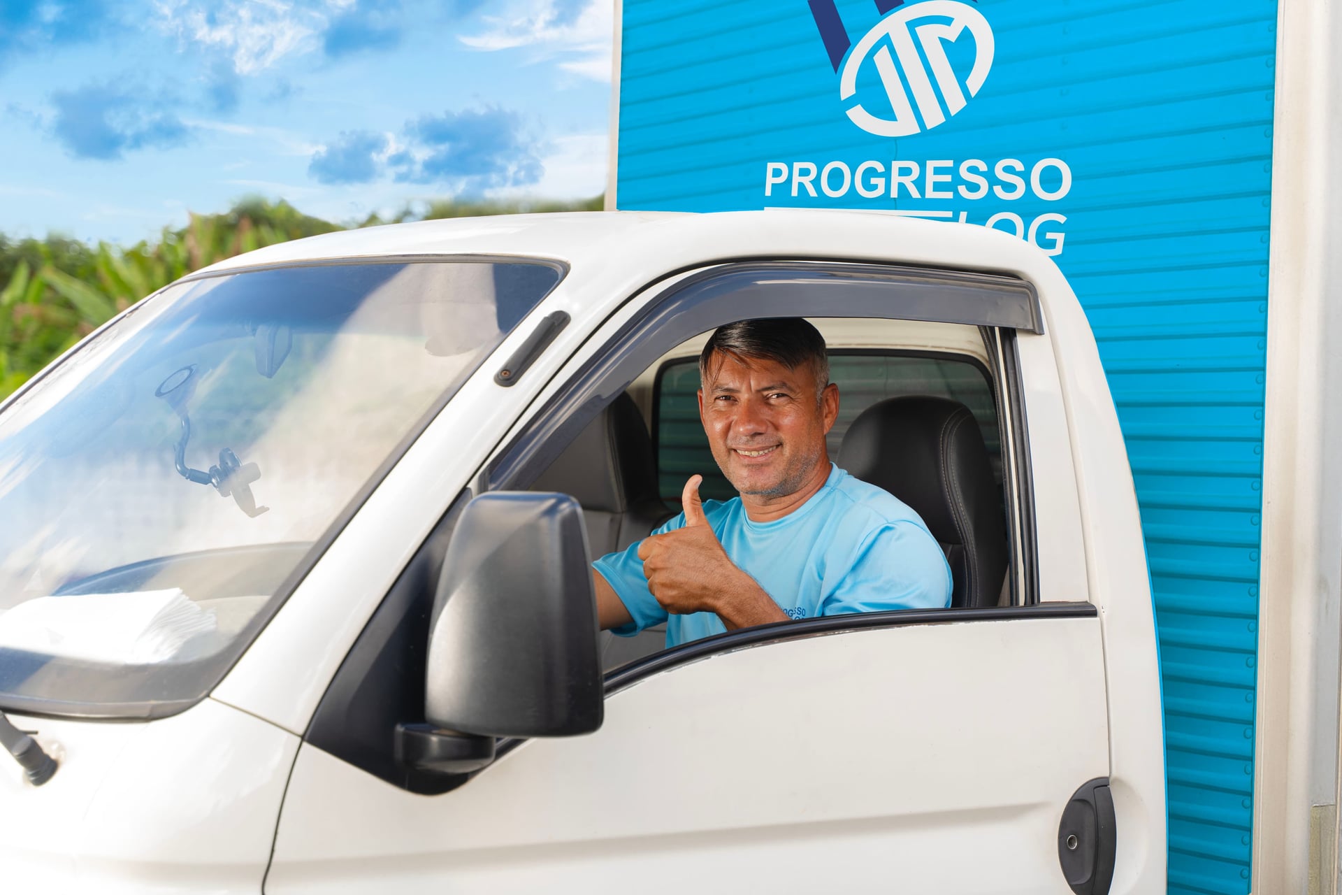 Motorista Progresso Log sorrindo